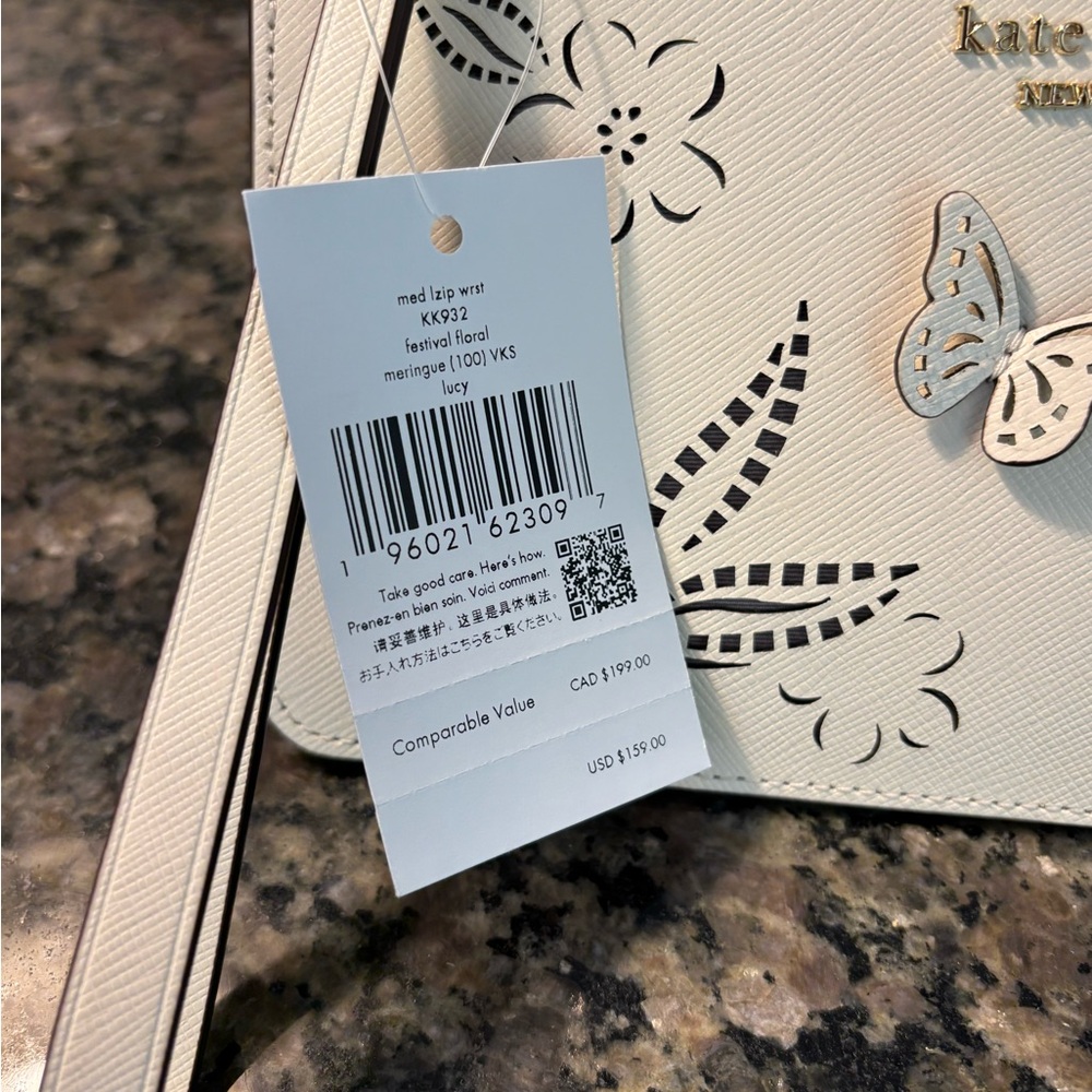 Kate Spade ♠️ Lucy Festival Perforated Floral Wristlet - Picture 2 of 3